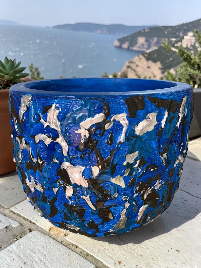 Pot de fleur décoratif bleu